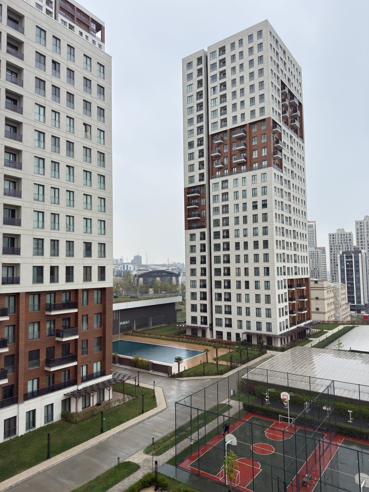 Residential towers above a still canal